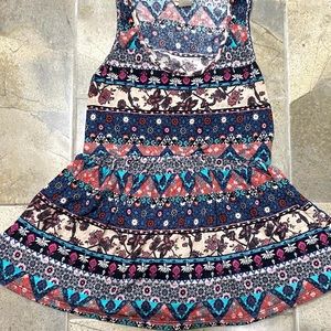 Gorgeous Tank Top that flares out at the bottom🤍